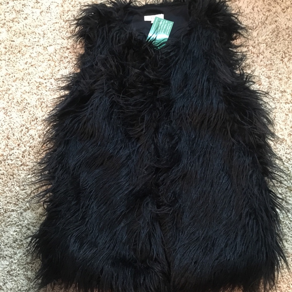 Furry vest with pockets